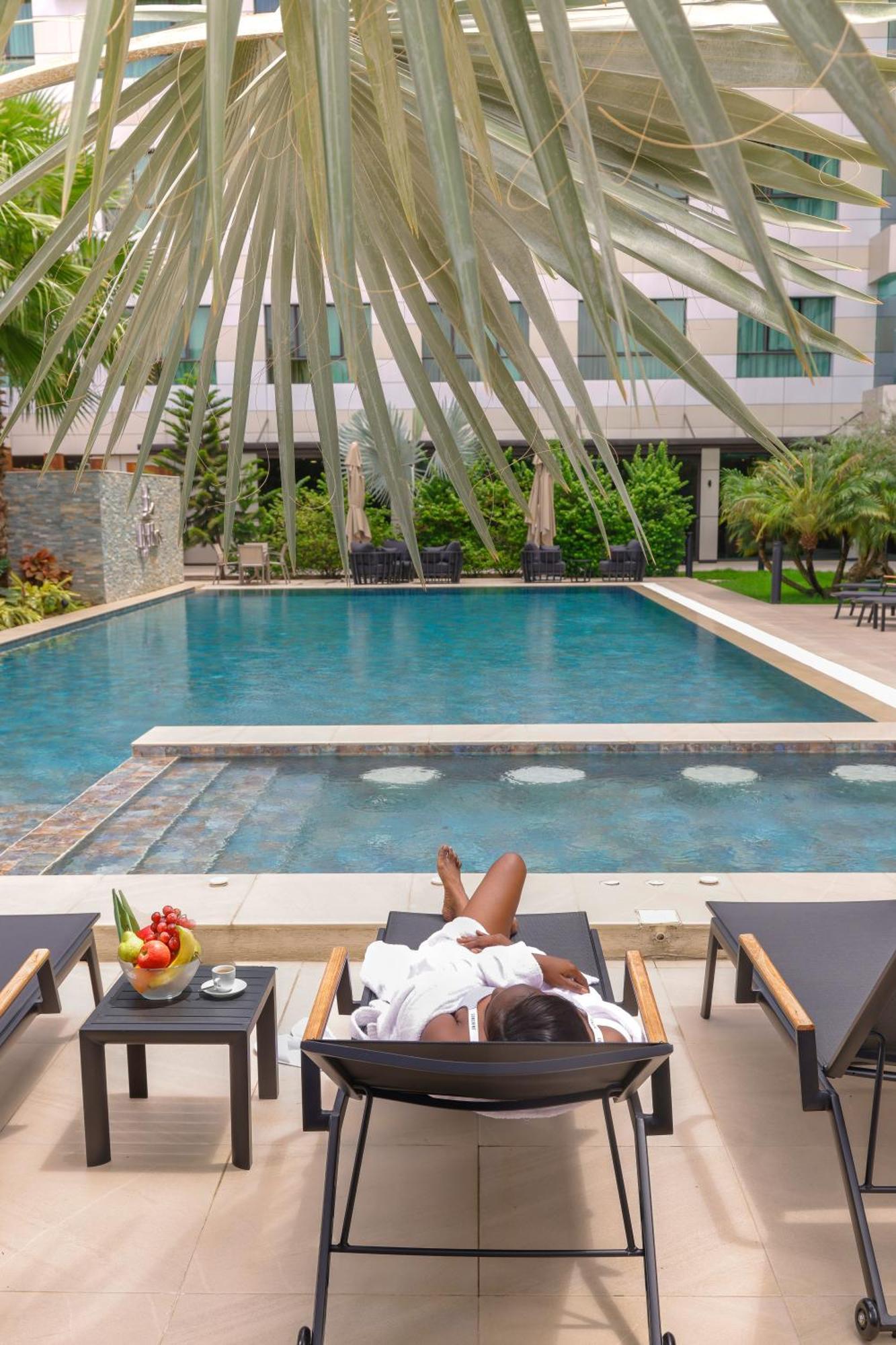 Byblos Hotel Abidjan Bagian luar foto